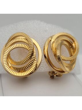 Circular Gold-Tone Clip Earrings Elegant Statement Accessory